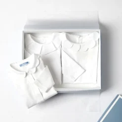 Baby girl bodysuit with petal collar